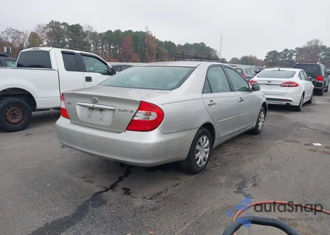 2003 Toyota Camry Le z USA, uszkodzony, nr VIN 4T1BE32K33U686148